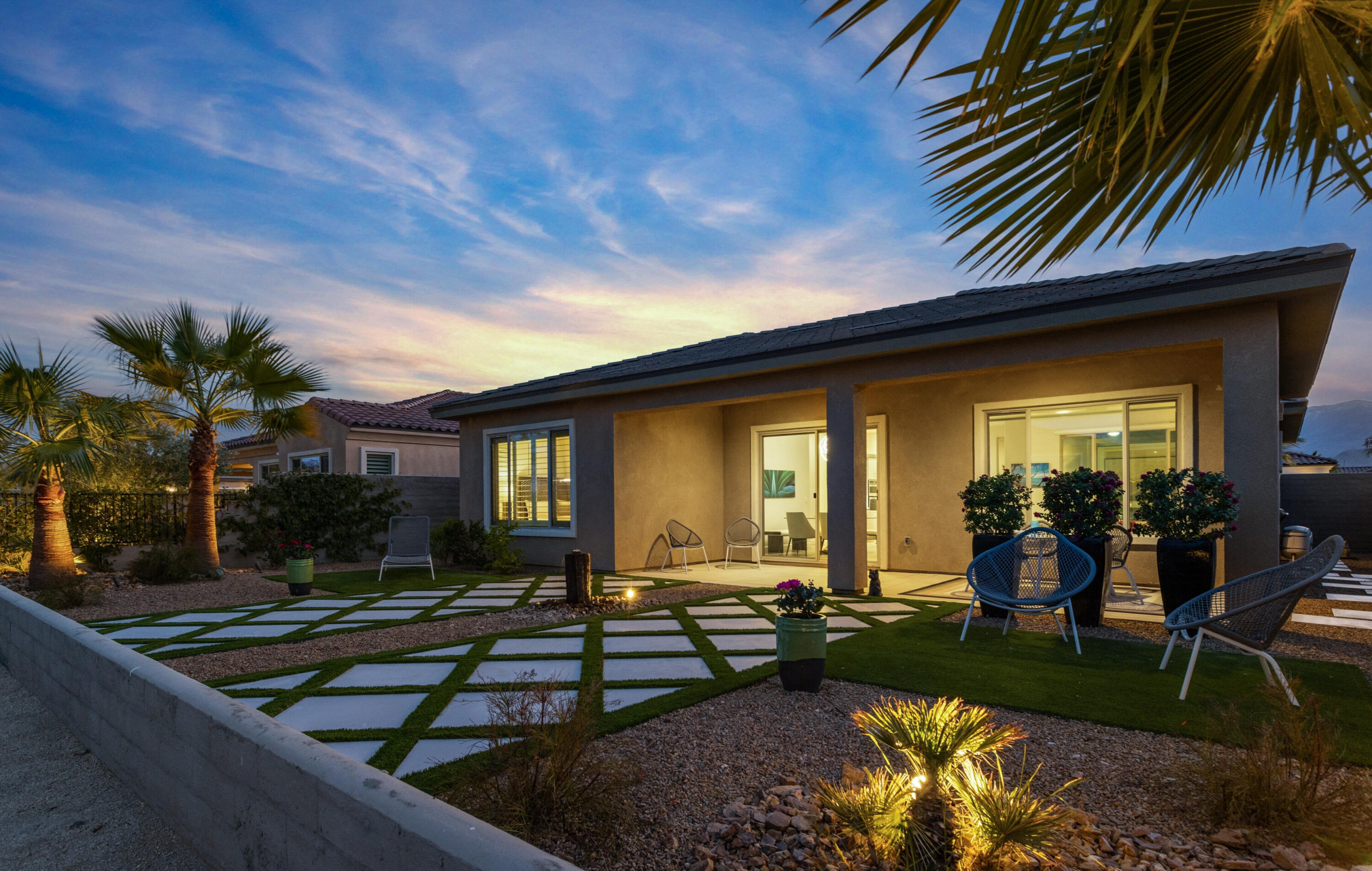 a front view of house with yard outdoor seating and barbeque oven