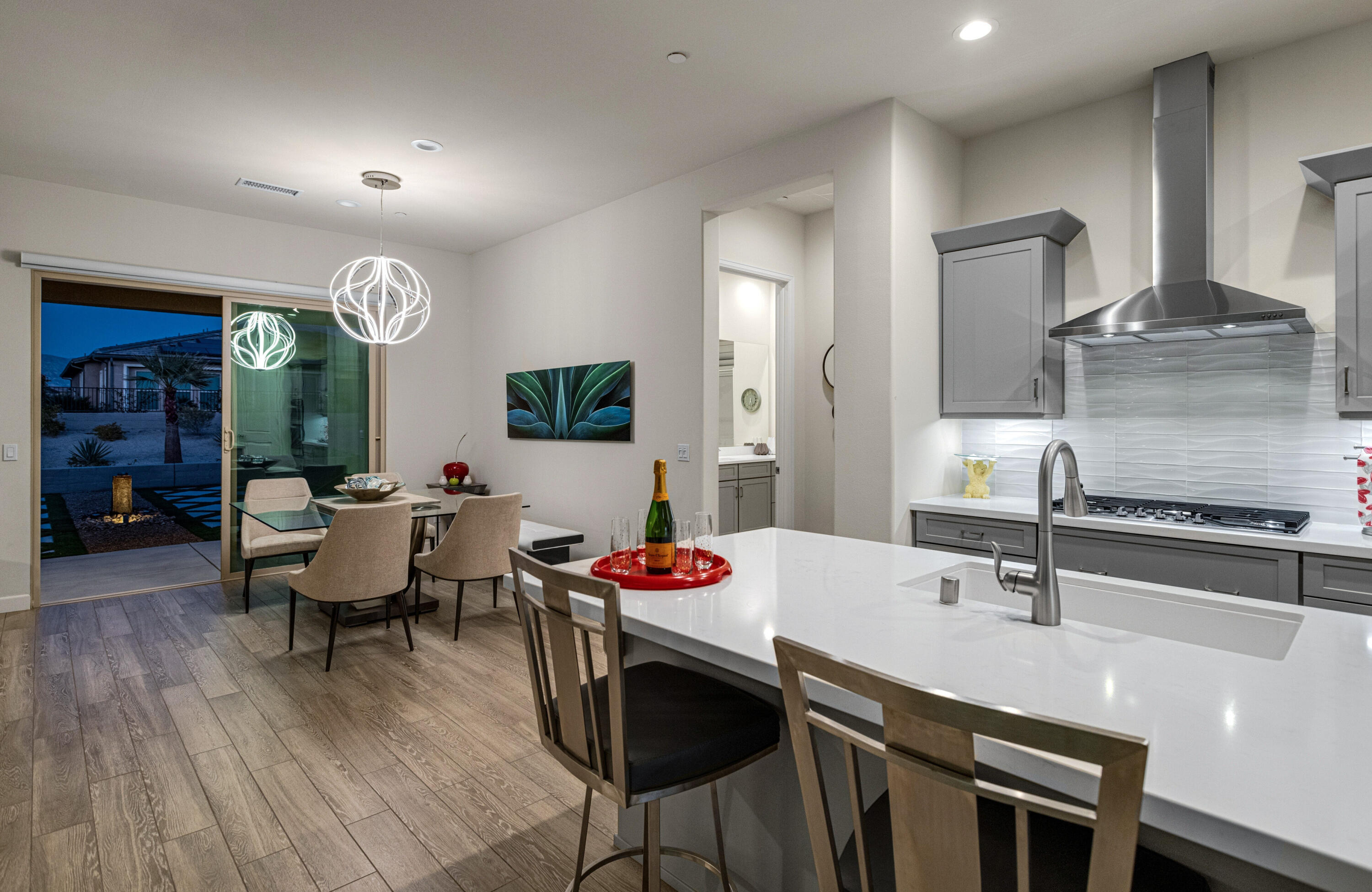 36 Chianti Rancho Mirage, CA 92270 - Photo 13 of 63 a kitchen with a table and chairs