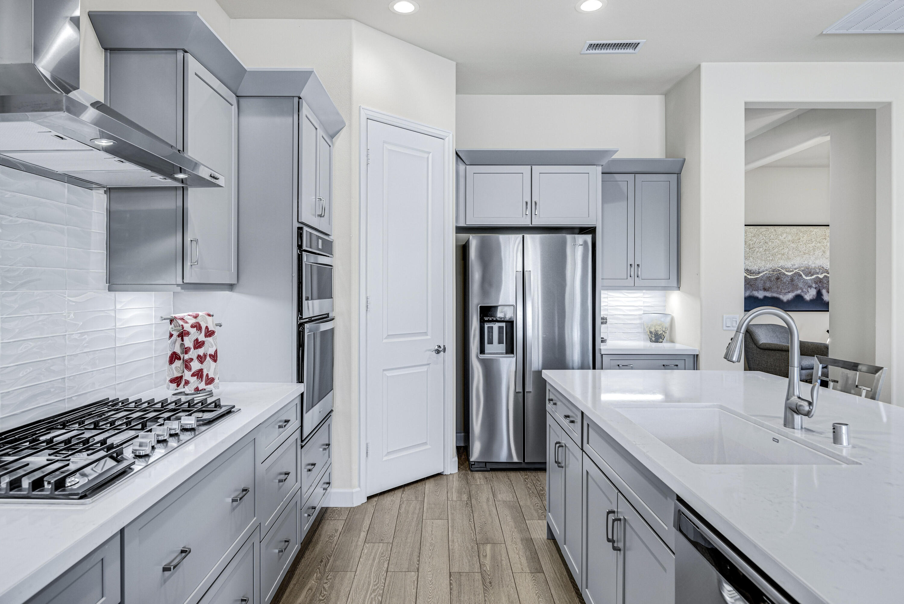 36 Chianti Rancho Mirage, CA 92270 - Photo 14 of 63 a kitchen with stainless steel appliances a sink stove and refrigerator