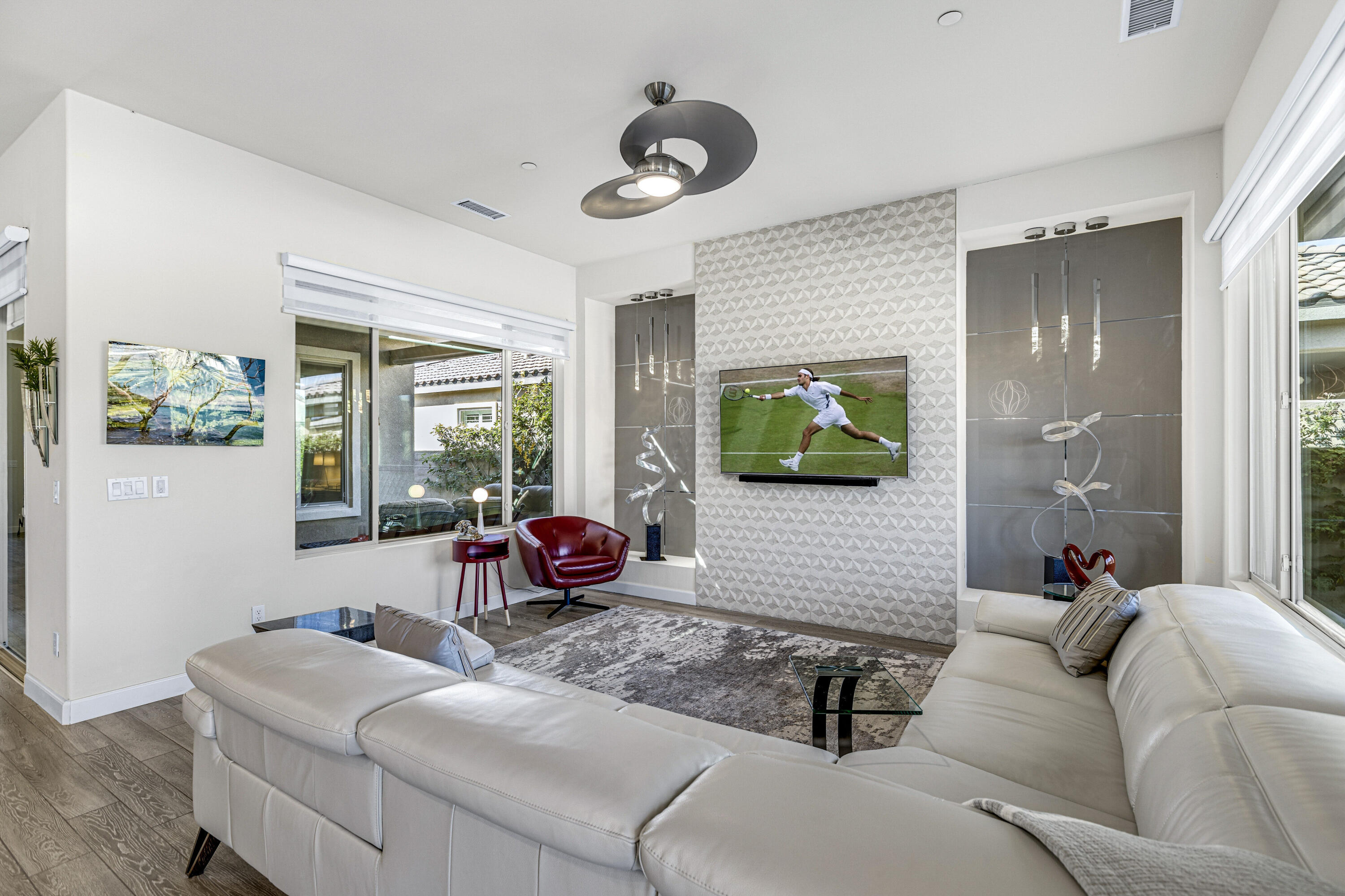 36 Chianti Rancho Mirage, CA 92270 - Photo 21 of 63 a living room with furniture and a flat screen tv