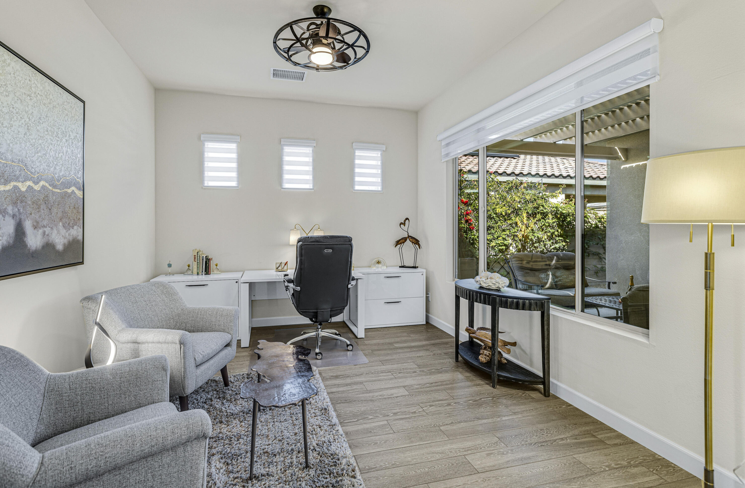 36 Chianti Rancho Mirage, CA 92270 - Photo 36 of 63 a view of a livingroom with workspace and a window