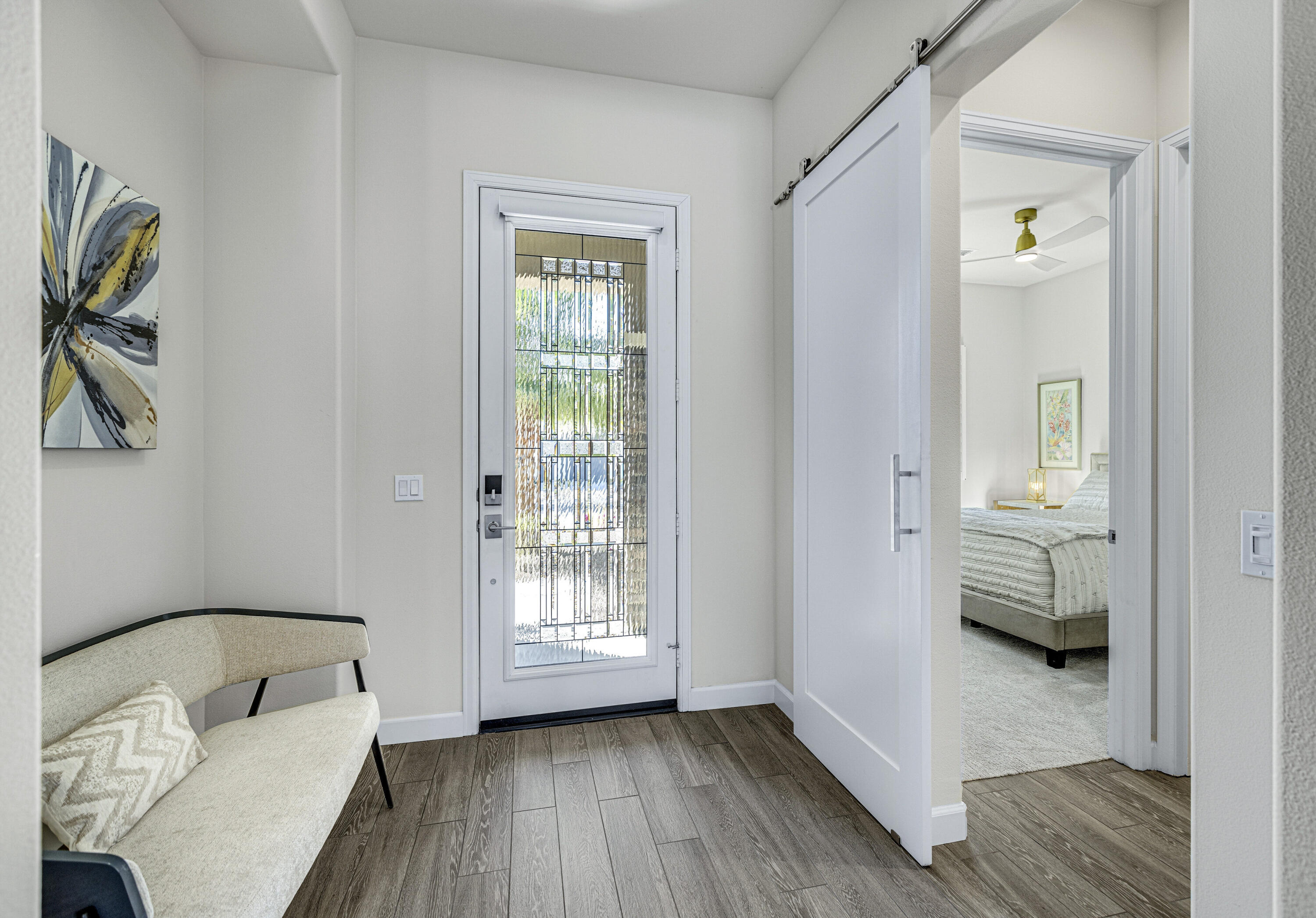 36 Chianti Rancho Mirage, CA 92270 - Photo 42 of 63 a view of livingroom with furniture and wooden floor
