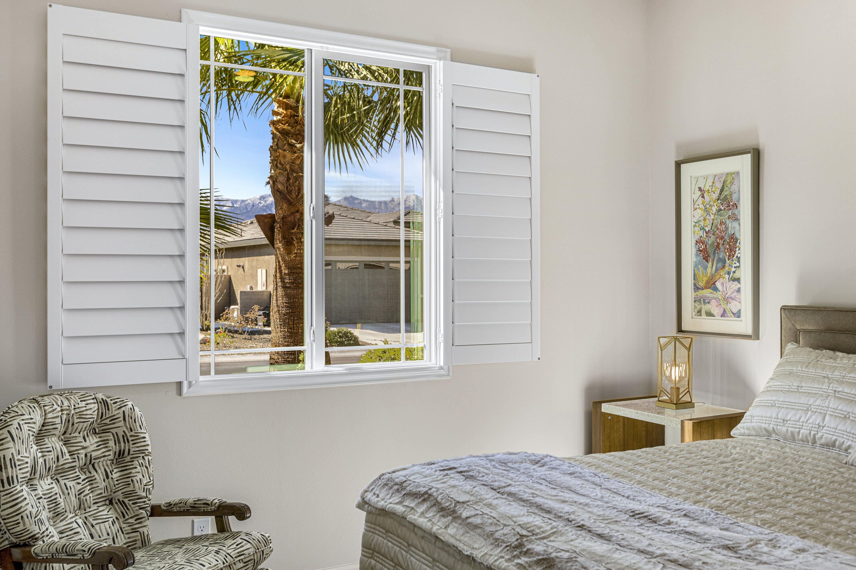 36 Chianti Rancho Mirage, CA 92270 - Photo 44 of 63 a bedroom with a bed and a window