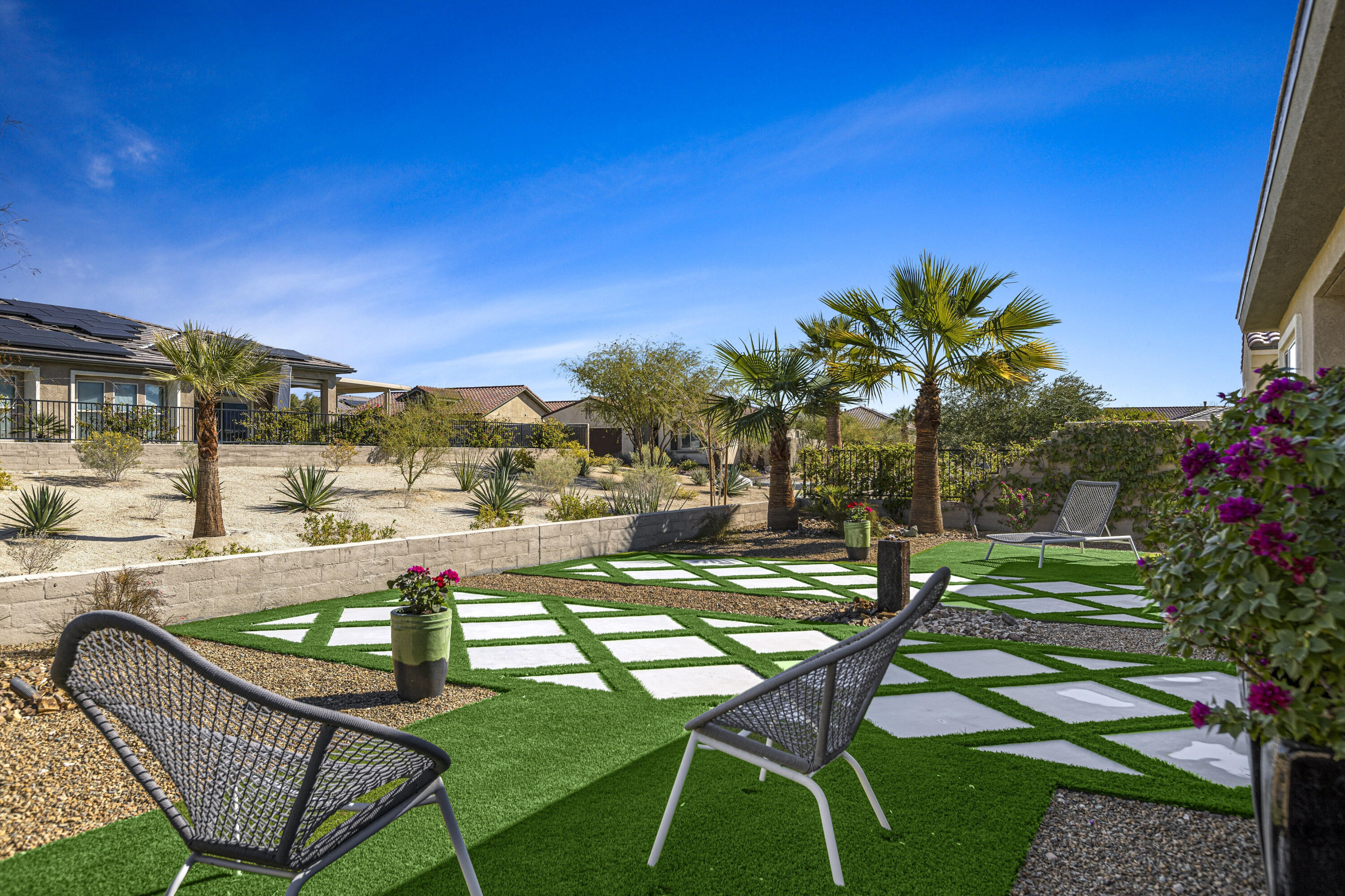 36 Chianti Rancho Mirage, CA 92270 - Photo 48 of 63 a swimming pool with outdoor seating and yard