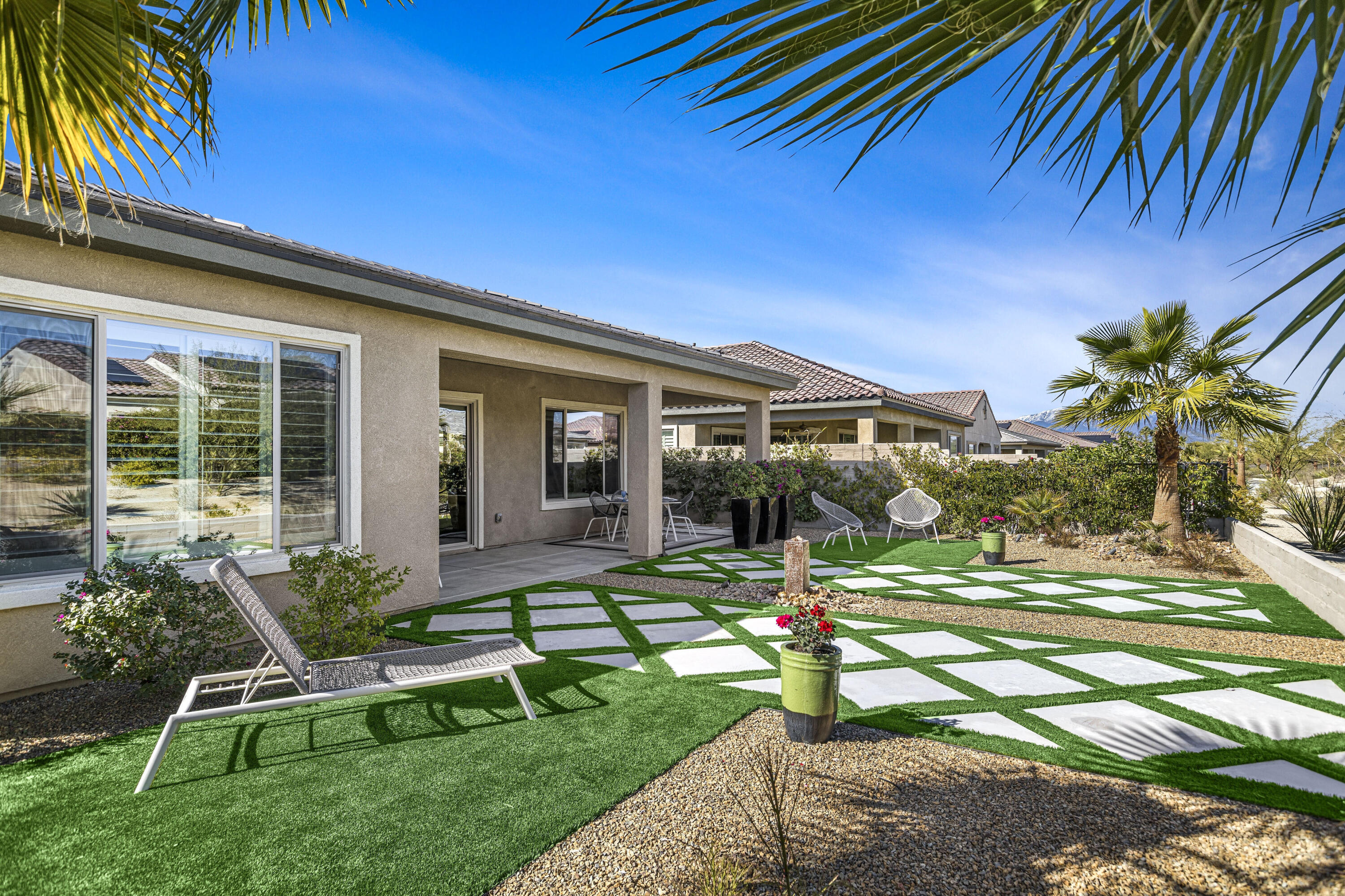 36 Chianti Rancho Mirage, CA 92270 - Photo 52 of 63 a view of a house with backyard porch and sitting area