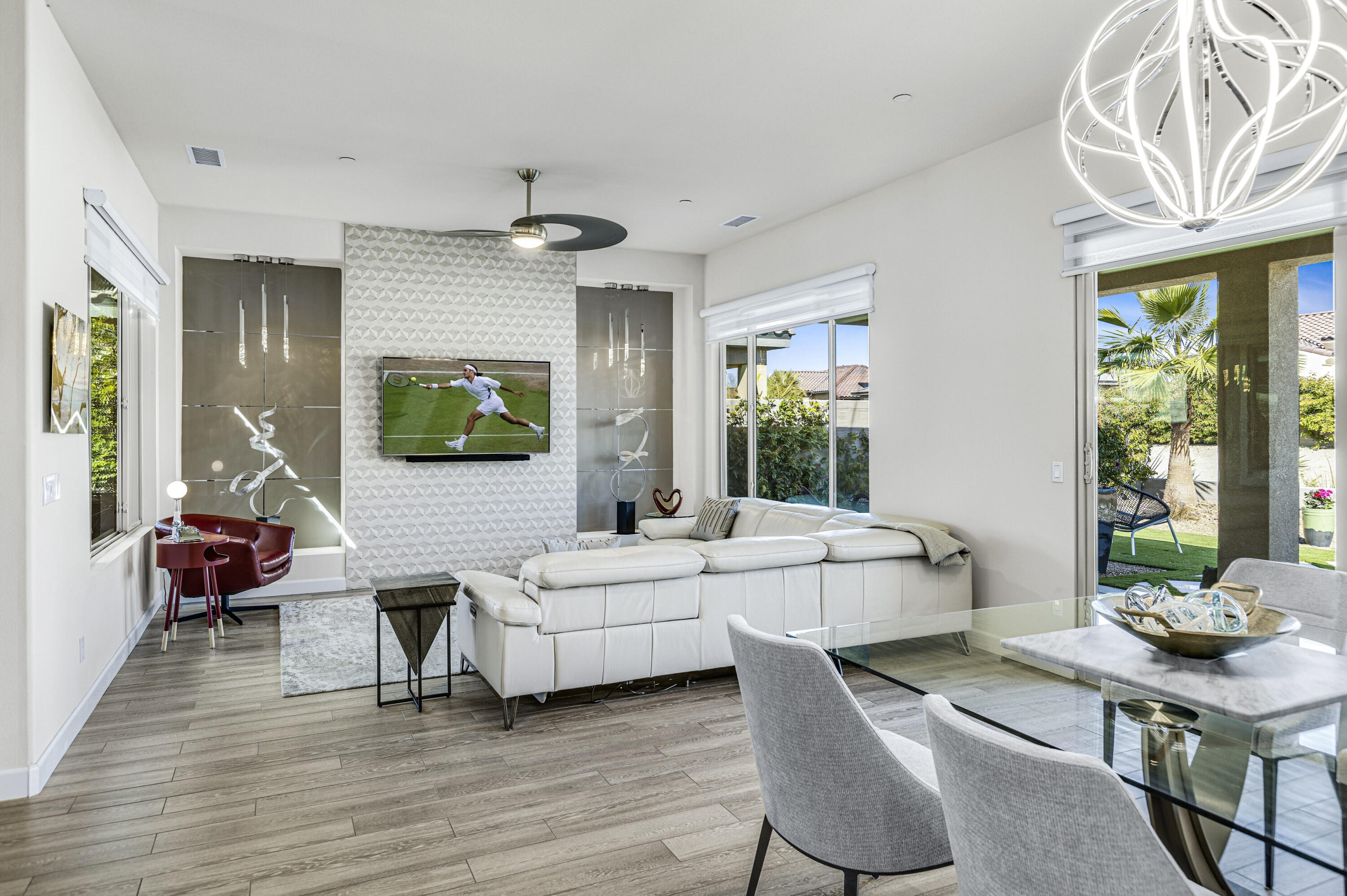 36 Chianti Rancho Mirage, CA 92270 - Photo 9 of 63 a living room with furniture a table and a large window