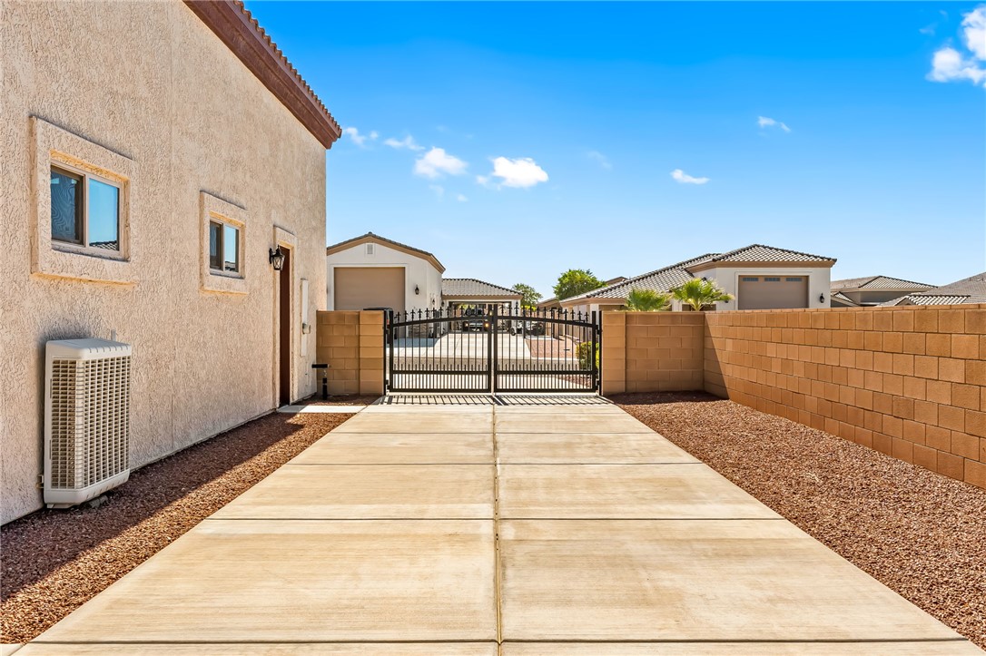 2605 Nez Perce Road Fort Mohave, AZ 86426 - Photo 40 of 53 View of patio / terrace with a gate and a garage