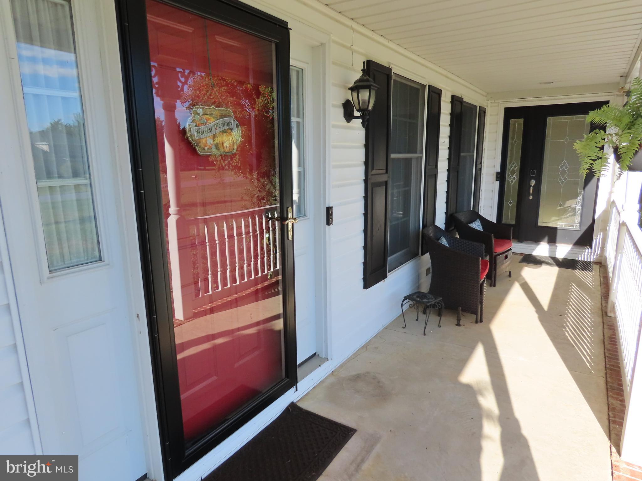 119 Leanne Drive Middletown, DE 19709 - Photo 12 of 27 front porch entry to main house & in-law suite