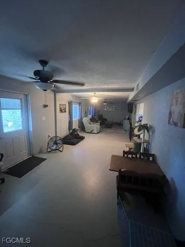 a room with gym equipment and a window