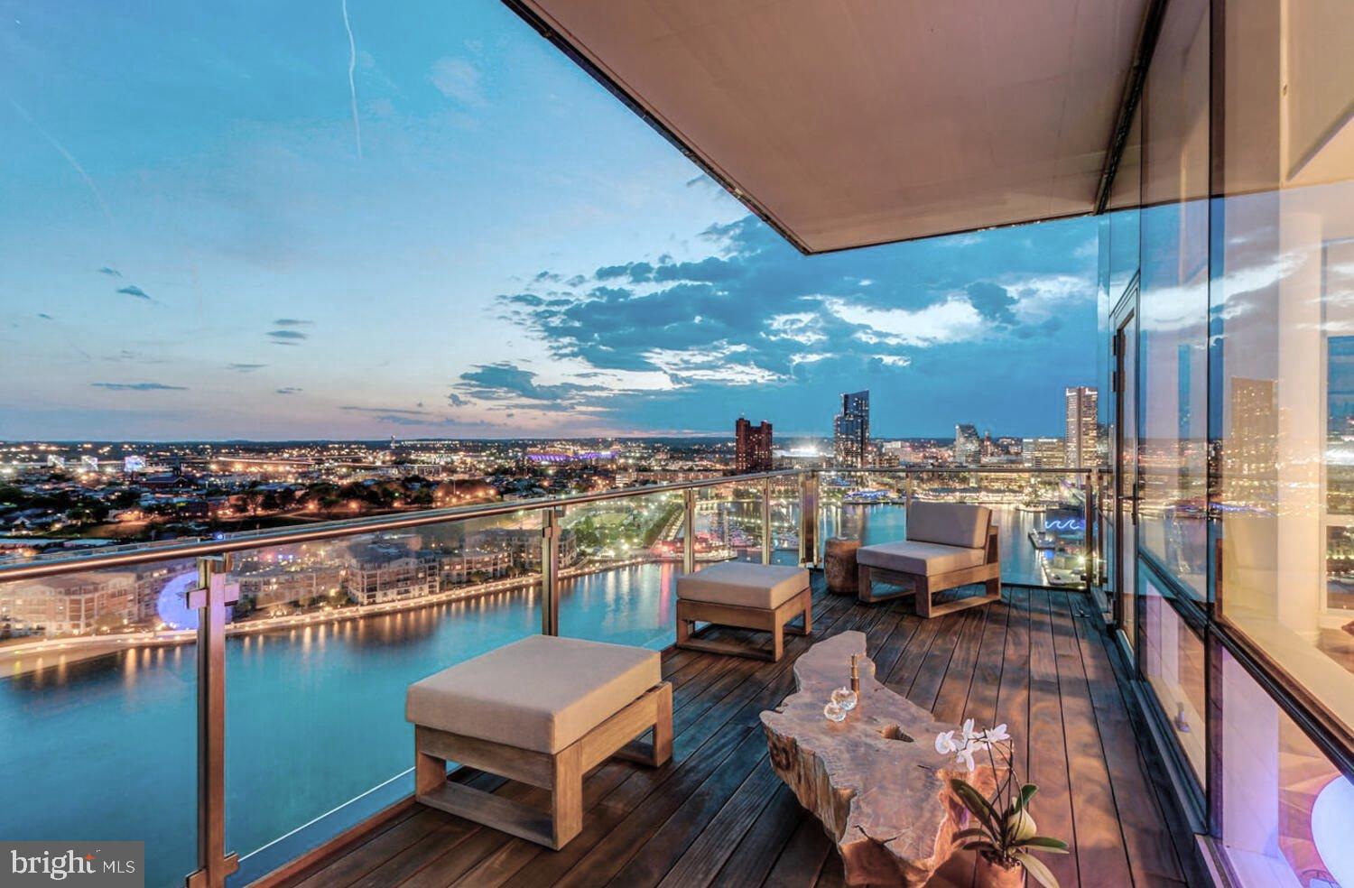 a view of a balcony with chairs