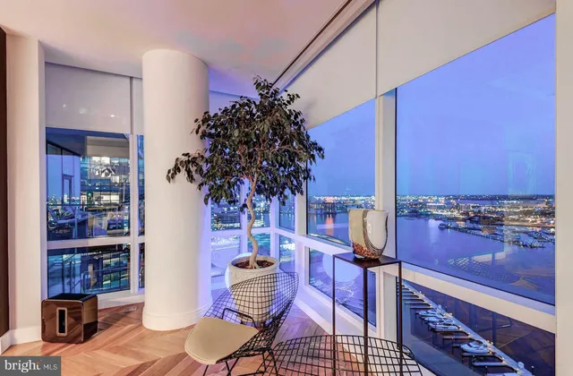 a view of a living room and dining room