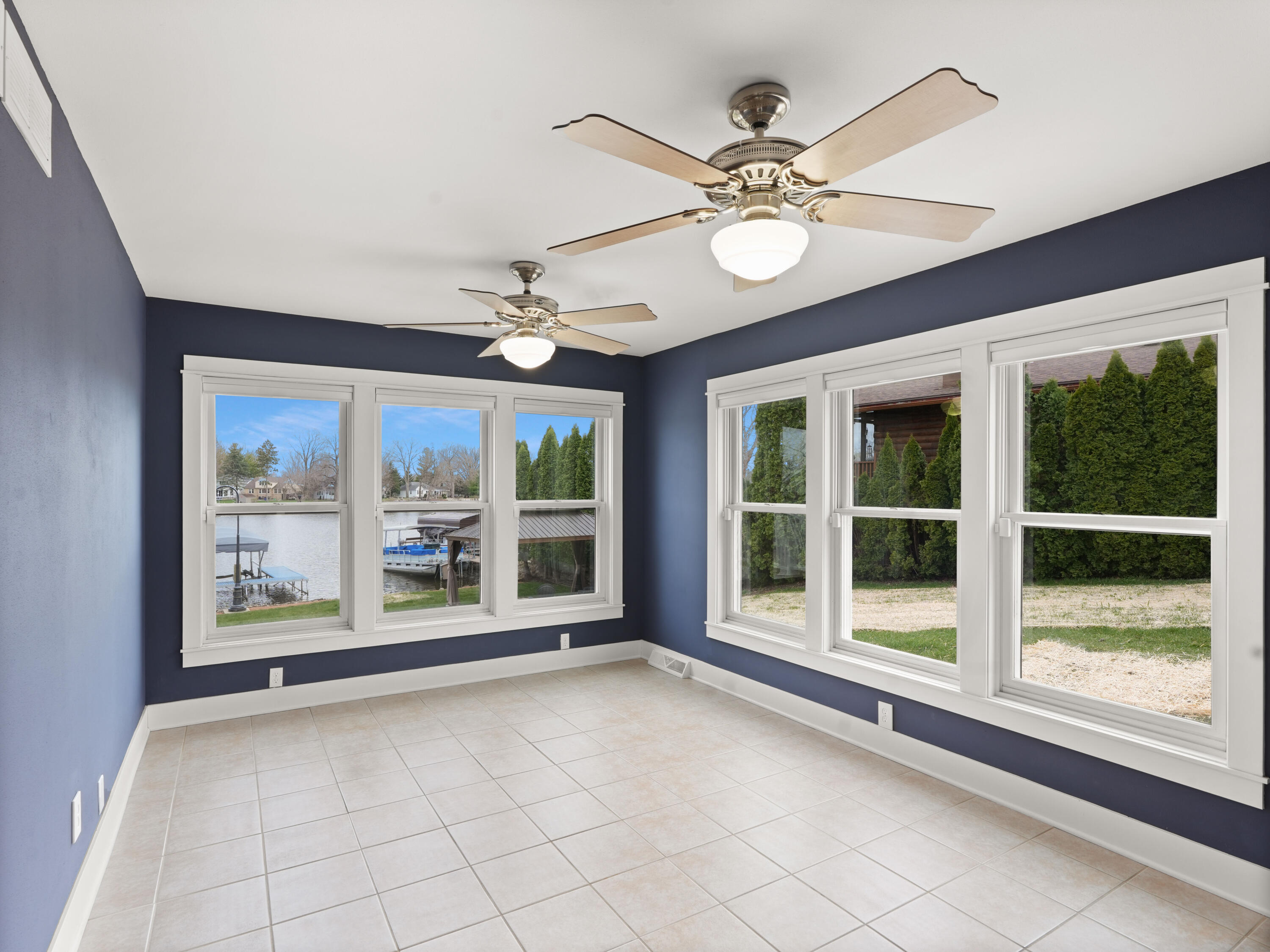 191 Riverside Drive Waterford, WI 53185 - Photo 29 of 91 27_Sunroom_Lake_View