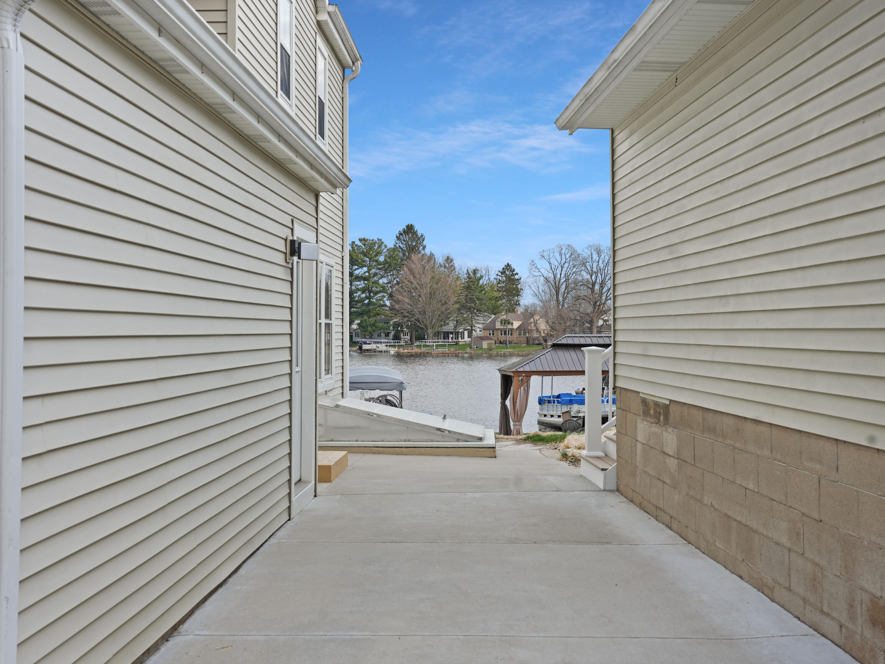 191 Riverside Drive Waterford, WI 53185 - Photo 75 of 91 74_Side_Walkway_Lake_View
