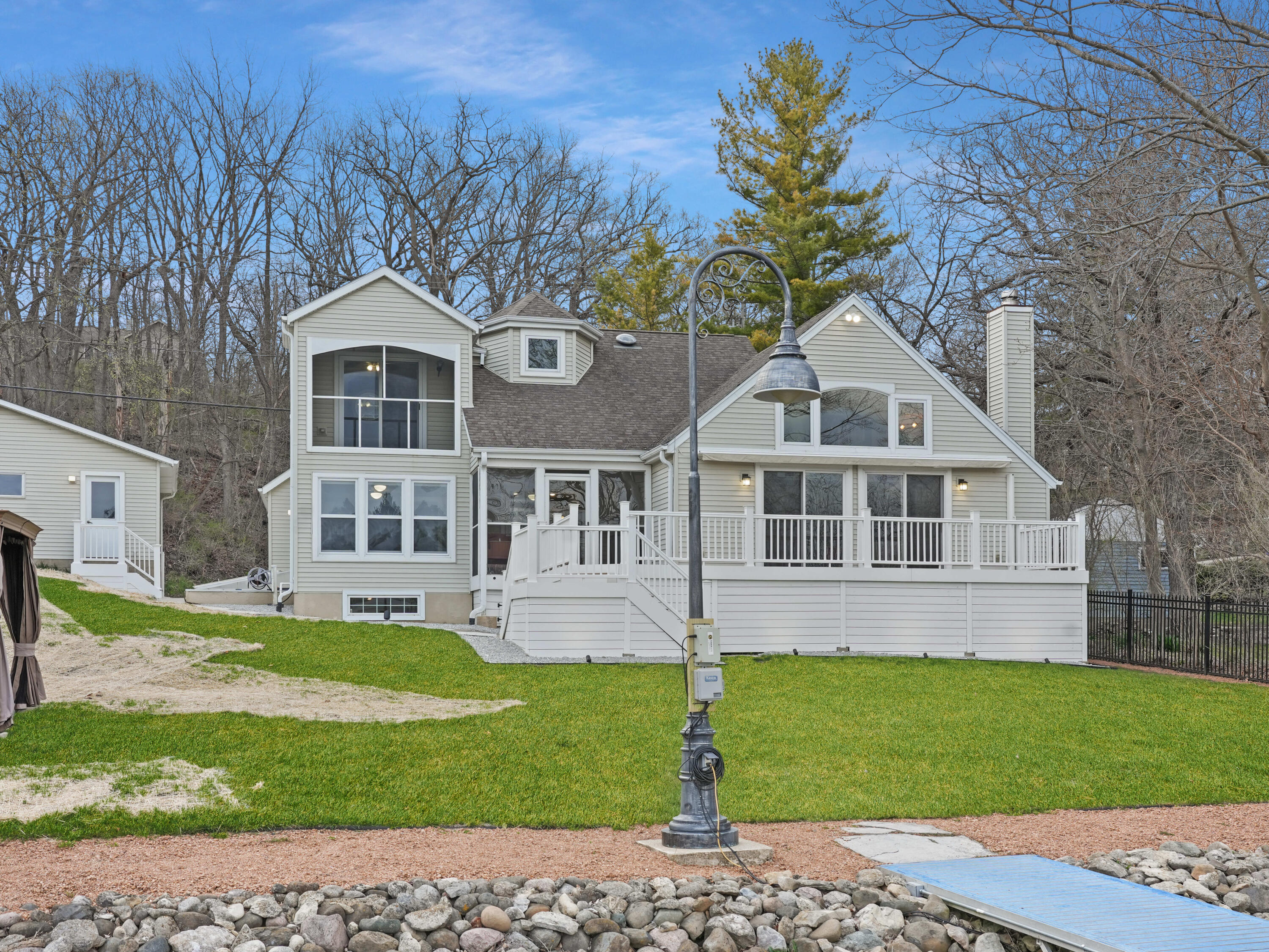 191 Riverside Drive Waterford, WI 53185 - Photo 79 of 91 78_Rear_Exterior_Lake_Sunset