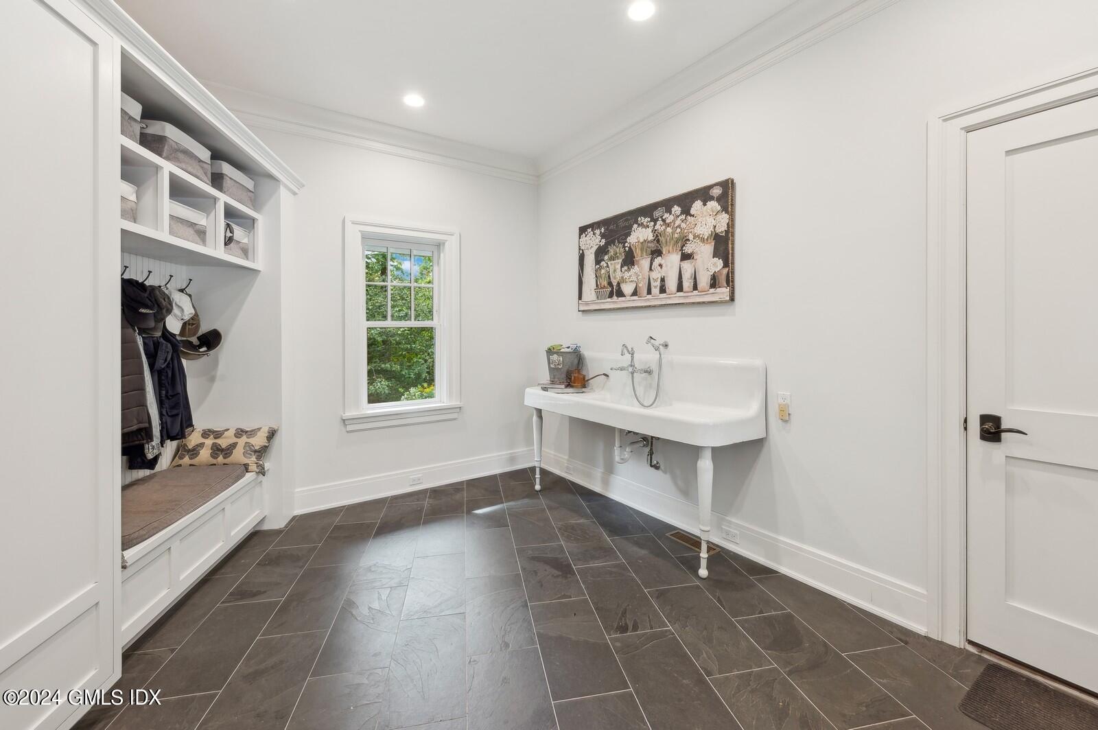 155 Cat Rock Road Cos Cob, CT 06807 - Photo 11 of 29 a view of a room with gym equipment and mirrors