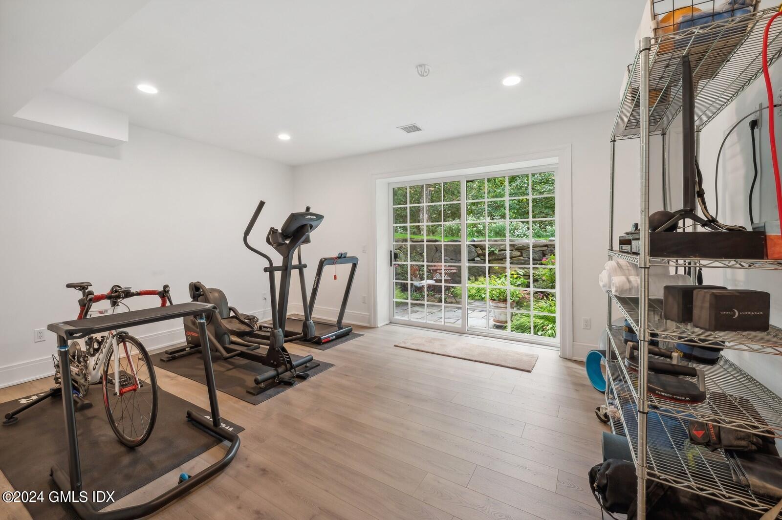 155 Cat Rock Road Cos Cob, CT 06807 - Photo 24 of 29 a view of a room with gym equipment