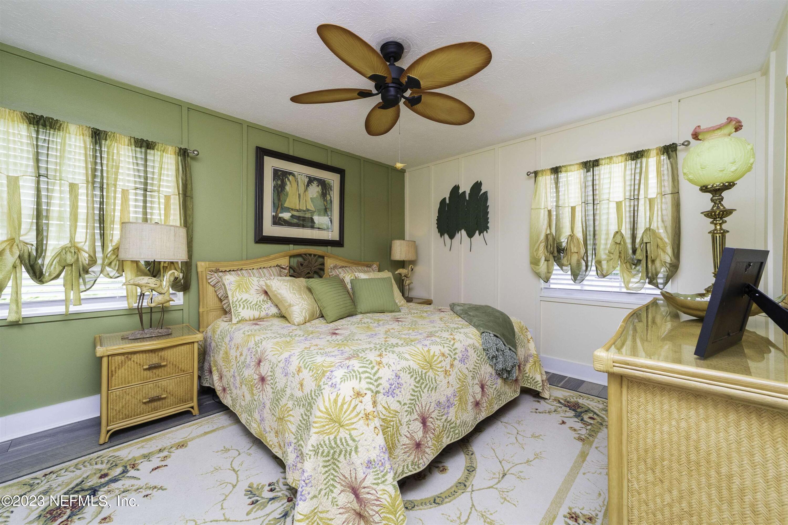 111 Loyola Road St. Augustine, FL 32086 - Photo 23 of 67 a bed room with a bed and a window
