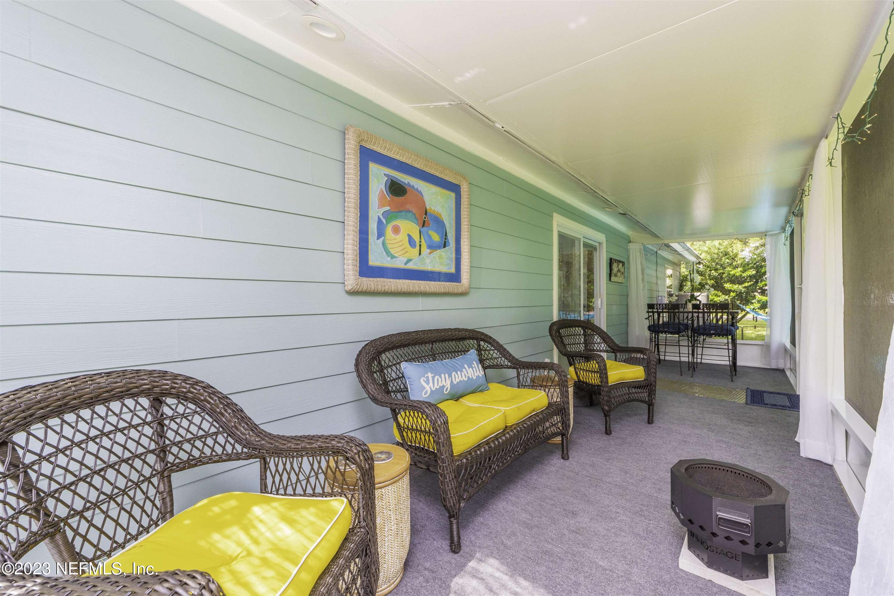111 Loyola Road St. Augustine, FL 32086 - Photo 45 of 67 a view of a swimming pool with a lounge chairs