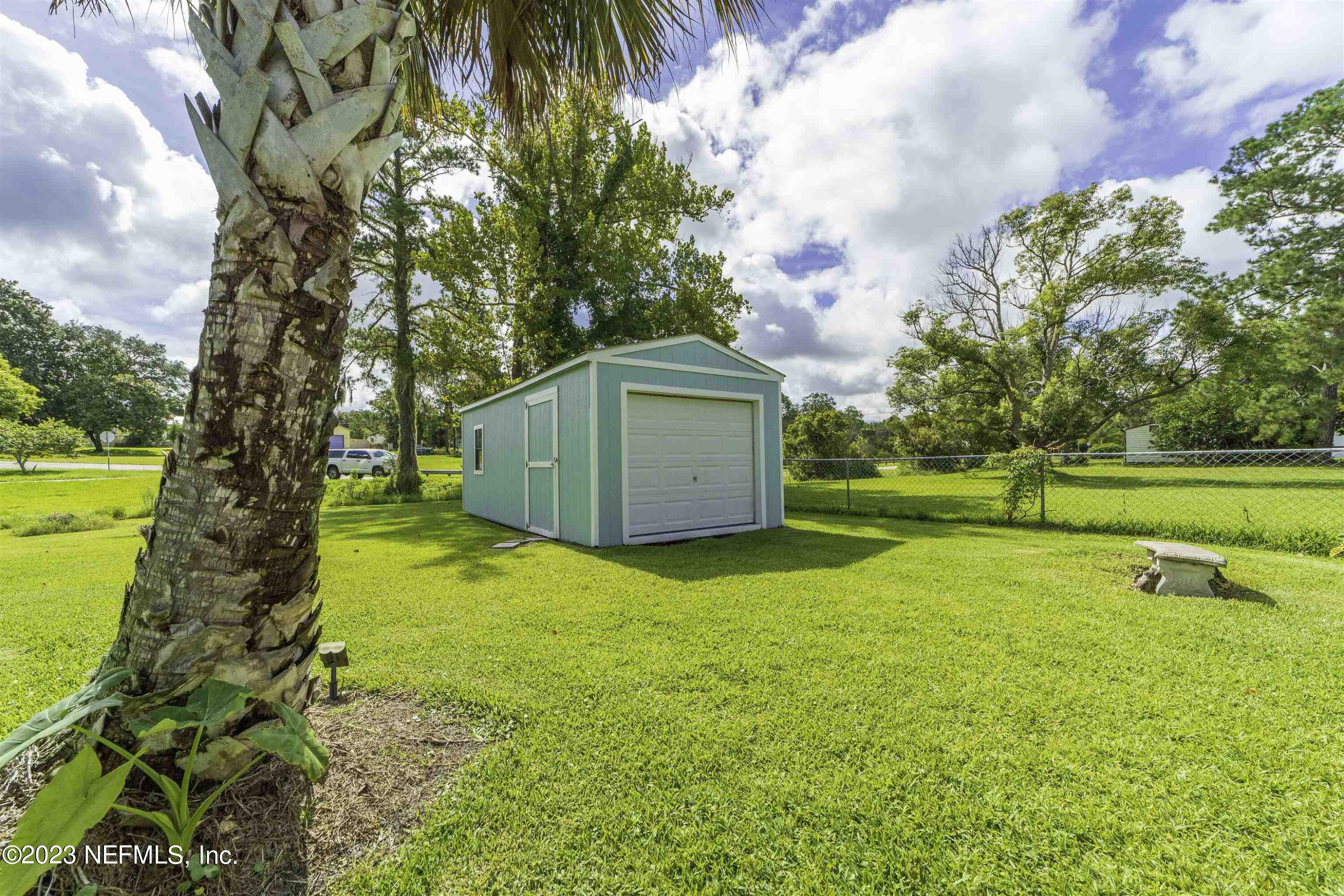 111 Loyola Road St. Augustine, FL 32086 - Photo 50 of 67 a view of swimming pool with an outdoor space and seating area