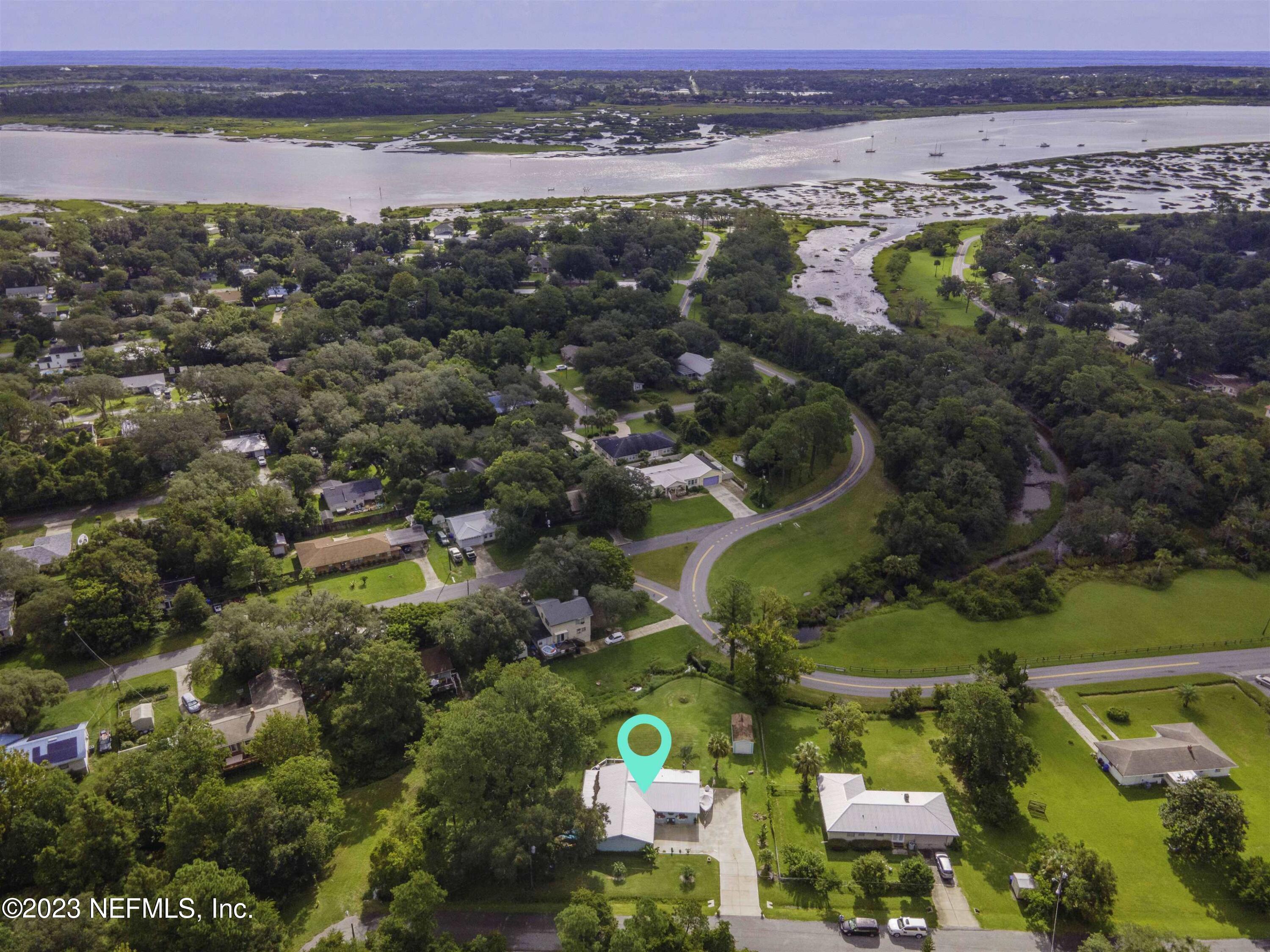 111 Loyola Road St. Augustine, FL 32086 - Photo 62 of 67 an aerial view of beach and residential houses with outdoor space
