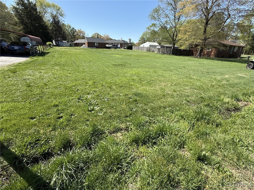 6117 Jessup Road North Chesterfield, VA 23234 - Photo 2 of 3 View of yard featuring a carport