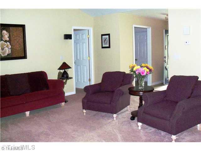 8811 Circle Rural Hall Nc 27045 Rural Hall, NC 27045 - Photo 4 of 16 Living Room. Spacious living room with dual sided fireplace.