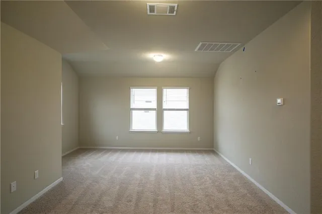 a bathroom with a sink toilet and a mirror