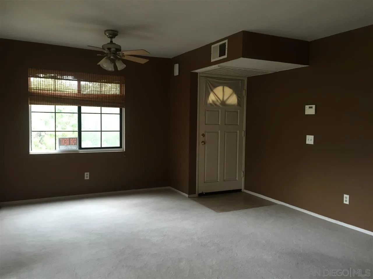 13294 Wimberly Square, Unit 228 San Diego, CA 92128 - Photo 15 of 24 an empty room with windows and fan