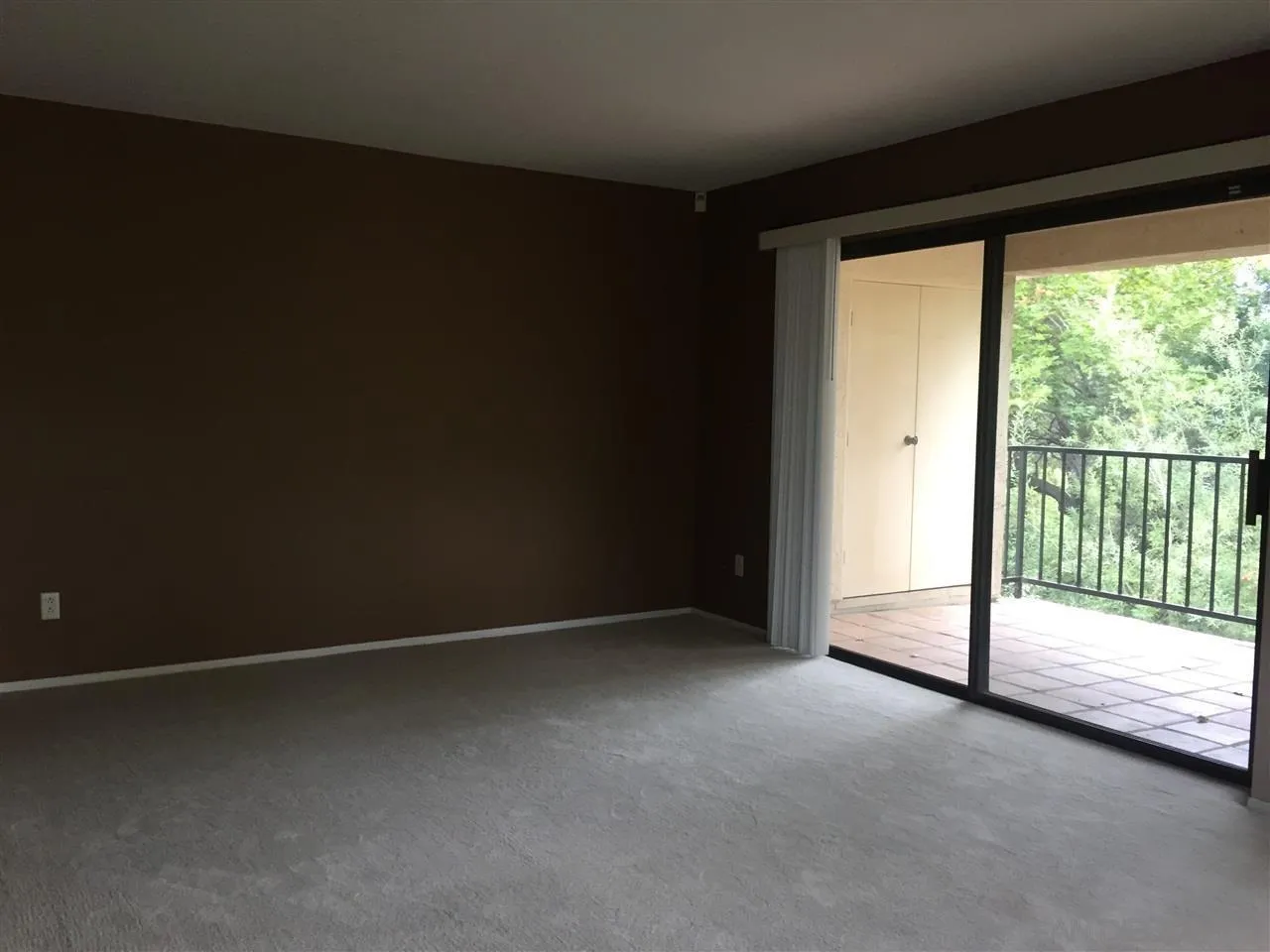 13294 Wimberly Square, Unit 228 San Diego, CA 92128 - Photo 17 of 24 a view of empty room with floor to ceiling window