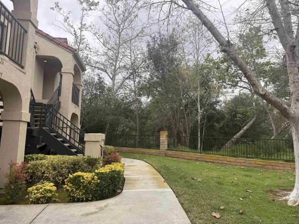 a view of a swimming pool with outdoor seating