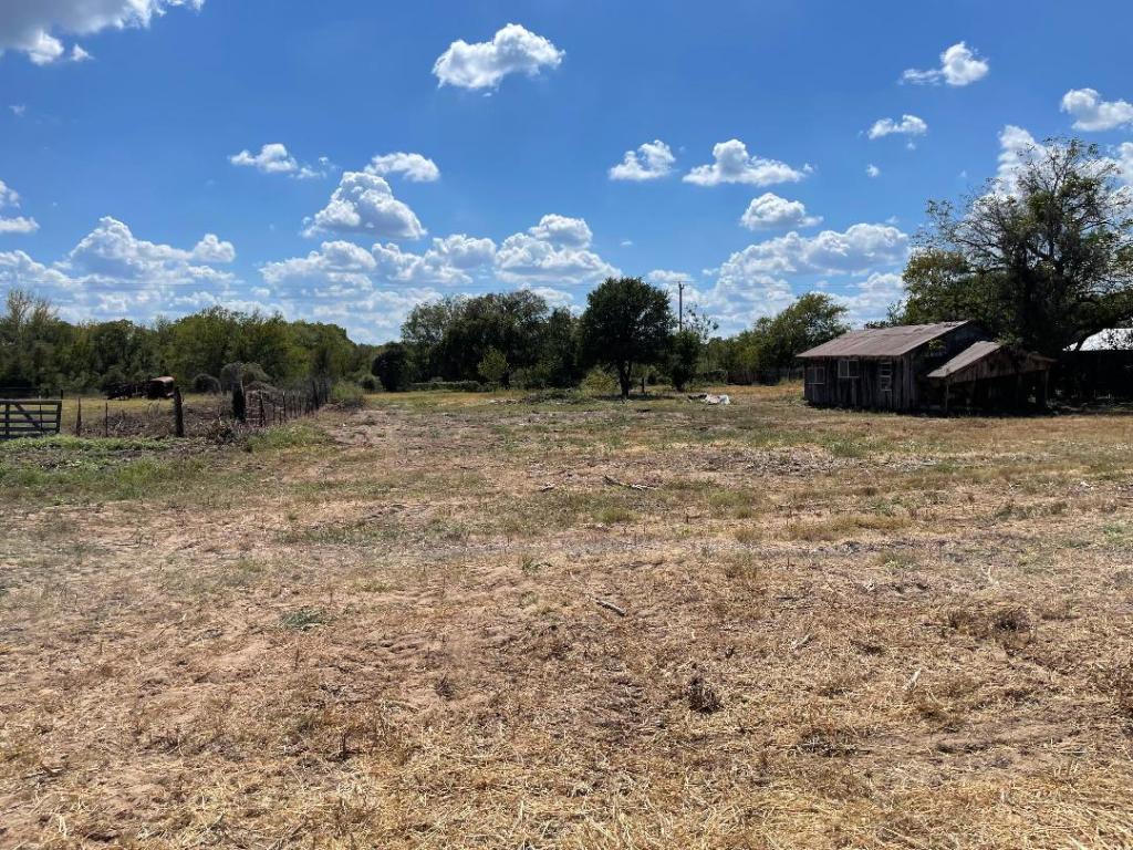 0 Young Road Smithville, TX 78957 - Photo 2 of 3 View of yard featuring a view of rural / pastoral area / fence