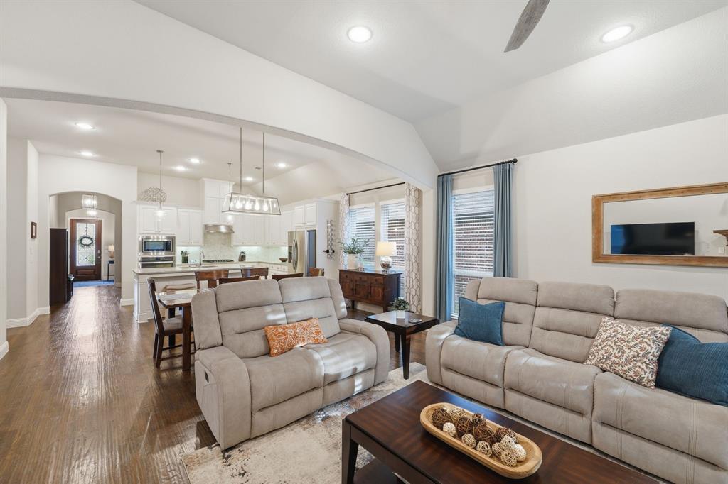 5105 Ember Place Little Elm, TX 76227 - Photo 14 of 35 a living room with furniture and a view of kitchen