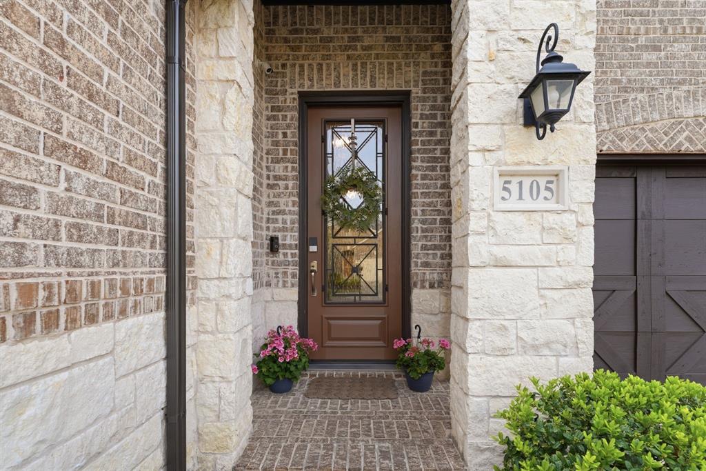 5105 Ember Place Little Elm, TX 76227 - Photo 2 of 35 a front view of a house with a garden