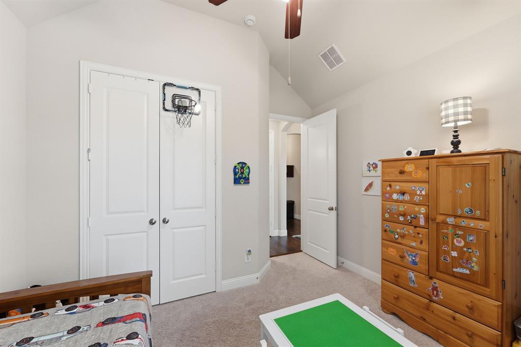 5105 Ember Place Little Elm, TX 76227 - Photo 27 of 35 a view of room with window and walk in closet