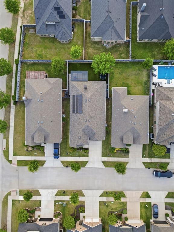 5105 Ember Place Little Elm, TX 76227 - Photo 31 of 35 an aerial view of residential houses with outdoor space and parking