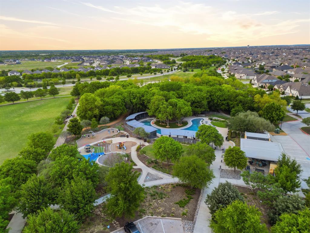 5105 Ember Place Little Elm, TX 76227 - Photo 33 of 35 an aerial view of residential houses with outdoor space and trees
