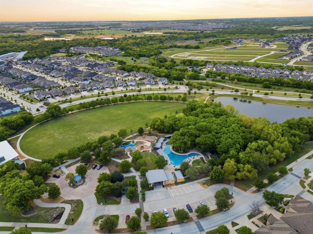 5105 Ember Place Little Elm, TX 76227 - Photo 34 of 35 an aerial view of ocean and residential houses with outdoor space