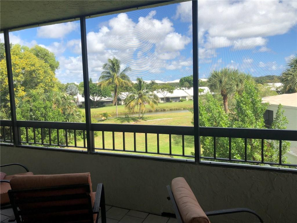 6463 La Costa Drive, Unit 305 Boca Raton, FL 33433 - Photo 19 of 20 a view of a city from a balcony