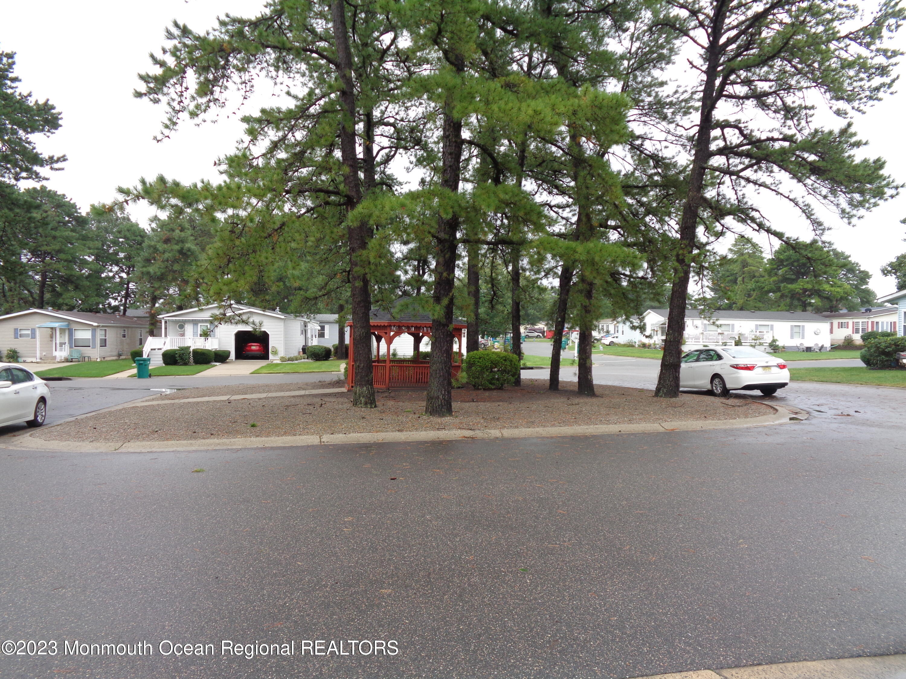 12 Pine Ridge Boulevard Whiting, NJ 08759 - Photo 2 of 23 a car parked on the side of the road