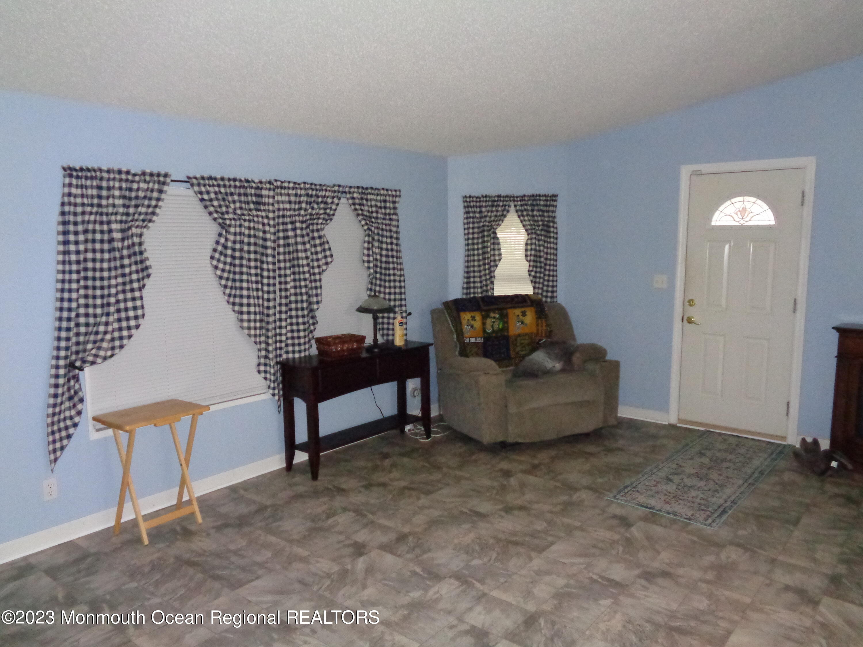 12 Pine Ridge Boulevard Whiting, NJ 08759 - Photo 4 of 23 a living room with furniture and a window