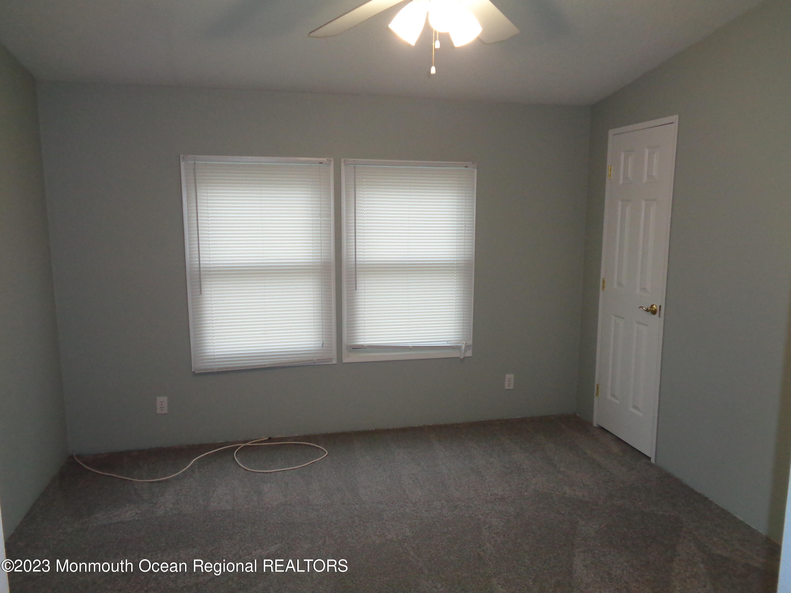 12 Pine Ridge Boulevard Whiting, NJ 08759 - Photo 9 of 23 an empty room with a window