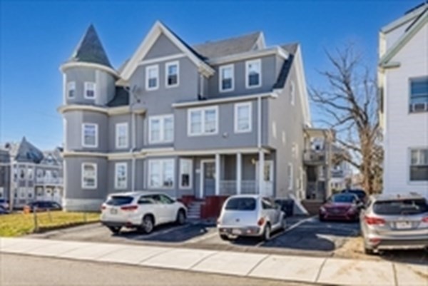 175 Hancock Street Everett, MA 02149 - Photo 4 of 15 a car parked in front of a building