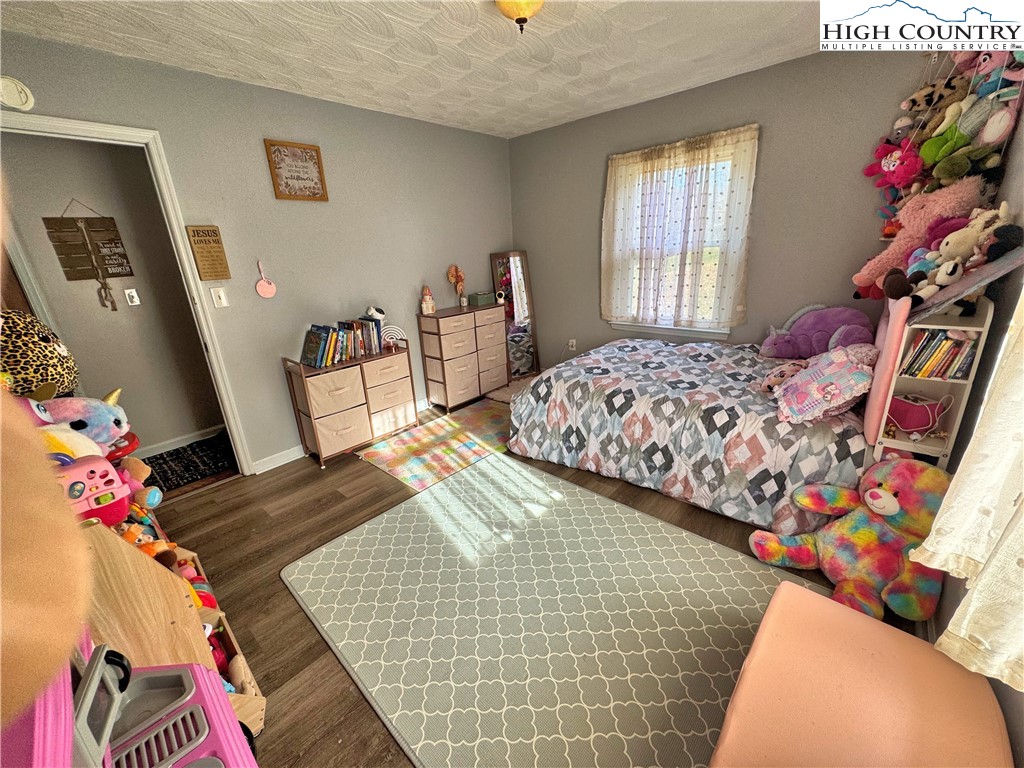 2047 Cline Road Rural Retreat, VA 24368 - Photo 14 of 35 a bedroom with bed and a window