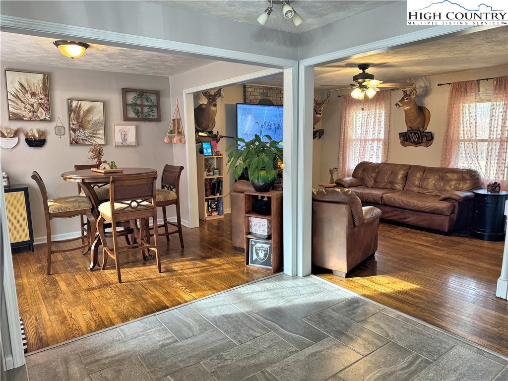2047 Cline Road Rural Retreat, VA 24368 - Photo 4 of 35 a living room with furniture and a dining table with kitchen view