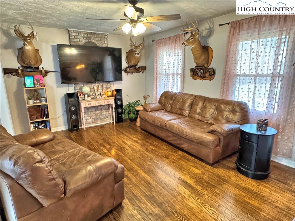 2047 Cline Road Rural Retreat, VA 24368 - Photo 8 of 35 a living room with furniture and a flat screen tv
