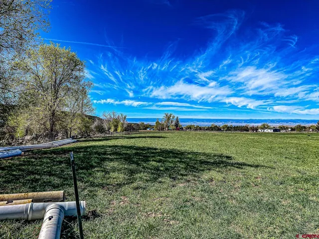 a view of an ocean and houses