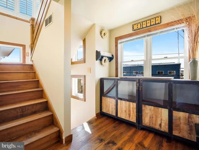 a bed room with a bed and a window