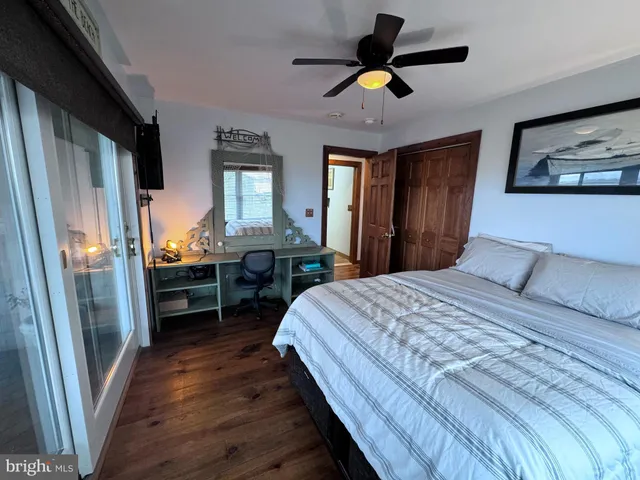 a view of a balcony with furniture