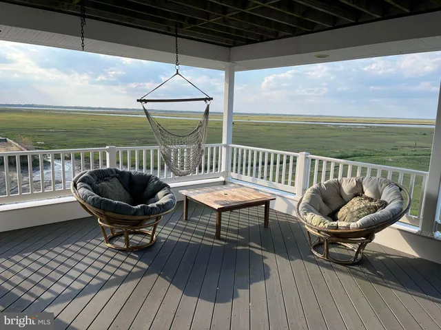 a bathroom with a sink toilet a mirror and shower