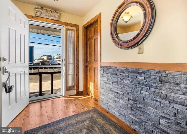 a view of entryway with washer and dryer